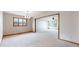 Open-concept living space offers ample room for entertaining and Gathering gatherings with natural light at 23 Carla Way, Broomfield, CO 80020