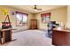 Well lit home office with lots of room and storage, perfect for working from home at 4700 Homestead St, Bow Mar, CO 80123