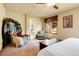 Relaxing main bedroom suite with lots of natural light and comfortable seating at 4700 Homestead St, Bow Mar, CO 80123