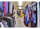 Spacious walk-in closet with clothing racks and shelving for ample storage at 4700 Homestead St, Bow Mar, CO 80123