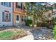 Charming townhome exterior with stone accents, front yard landscaping, and a welcoming entrance at 12059 E Hoye Dr, Aurora, CO 80012