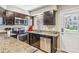 Well-equipped kitchen with stainless steel appliances, granite countertops, and ample cabinet space at 12059 E Hoye Dr, Aurora, CO 80012