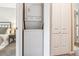 Convenient laundry closet with stacked washer and dryer at 12059 E Hoye Dr, Aurora, CO 80012