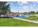 Local playground with slides, climbing structures, and wood chip ground cover at 12059 E Hoye Dr, Aurora, CO 80012