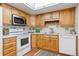 Bright kitchen with ample storage and modern appliances at 13691 E Marina Dr # 106, Aurora, CO 80014