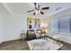 Bright living room featuring modern furniture, stylish decor, and hardwood floors, creating a welcoming atmosphere at 5873 Ceylon St # E, Denver, CO 80249