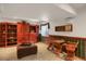 Finished basement features ample storage, recreation space, and a window with natural light at 6112 Alkire Ct, Arvada, CO 80004