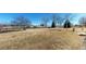 Picturesque backyard view of a lush green space, walking trail, and gazebo creating a tranquil setting at 2238 Calais Dr # B, Longmont, CO 80504