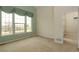 Bright bedroom featuring large windows with golf course views at 2238 Calais Dr # B, Longmont, CO 80504