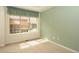 Bedroom featuring a bright window and neutral wall paint at 2238 Calais Dr # B, Longmont, CO 80504