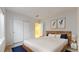 Cozy bedroom with a decorative headboard and ample closet space at 2238 Calais Dr # B, Longmont, CO 80504