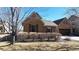 Charming single-story home with a stone and stucco exterior and well-maintained landscaping at 2238 Calais Dr # B, Longmont, CO 80504