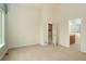 Bright and spacious bedroom with access to walk-in closet and en-suite bathroom featuring shower at 2238 Calais Dr # B, Longmont, CO 80504