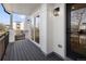 Exterior view of a private balcony with black railings and modern lighting fixtures at 4511 Tabor St, Wheat Ridge, CO 80033