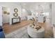 Spacious living room with hardwood floors, neutral decor, and an open concept layout at 4511 Tabor St, Wheat Ridge, CO 80033