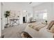 Relaxing main bedroom with a view of the ensuite bathroom and walk-in closet at 4511 Tabor St, Wheat Ridge, CO 80033