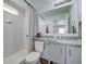 Clean bathroom features a walk-in shower, granite countertops, and modern fixtures at 13079 E 103Rd Pl, Commerce City, CO 80022