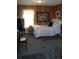 Comfortable bedroom with natural light, cozy carpet, and a double bed at 5095 Grant St, Denver, CO 80216