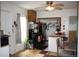 A vintage kitchen featuring wood floors, overhead lighting, and a breakfast bar at 5095 Grant St, Denver, CO 80216