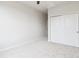 Bedroom with neutral carpet and a sliding door closet at 85 Uinta Way # 405, Denver, CO 80230