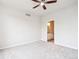Bedroom with neutral carpet and a ceiling fan at 85 Uinta Way # 405, Denver, CO 80230