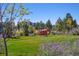 View of community art (cow) in a manicured community green space at 85 Uinta Way # 405, Denver, CO 80230