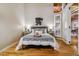 Cozy bedroom with hardwood floors, contemporary decor, and lots of natural light at 1745 Wazee St # 4G, Denver, CO 80202