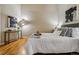 Bright bedroom featuring hardwood floors and contemporary decor at 1745 Wazee St # 4G, Denver, CO 80202