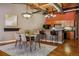 Bright dining area featuring a stylish rug, and an adjacent kitchen, perfect for gatherings and entertaining at 1745 Wazee St # 4G, Denver, CO 80202
