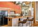 Modern kitchen with wood cabinets, stainless appliances, and breakfast bar, great for casual dining and entertaining at 1745 Wazee St # 4G, Denver, CO 80202