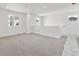 Bright bedroom with neutral carpet and a large window, creating a peaceful retreat with ample natural light at 24769 E 39Th Ave, Aurora, CO 80019