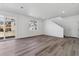 Bright and spacious living room with hardwood floors and access to the backyard at 24769 E 39Th Ave, Aurora, CO 80019