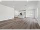 Open-concept living area featuring hardwood floors, recessed lighting, and plenty of natural light at 24769 E 39Th Ave, Aurora, CO 80019