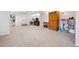 Spacious finished basement area with neutral carpet, and ' play area at 1762 Red Fox Pl, Highlands Ranch, CO 80126