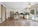 Open kitchen with stainless steel appliances, a center island, and modern lighting fixtures at 1762 Red Fox Pl, Highlands Ranch, CO 80126