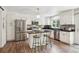 Stylish kitchen with a functional island, modern appliances, and sleek countertops at 1762 Red Fox Pl, Highlands Ranch, CO 80126