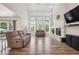 Spacious living room with soaring ceilings and a modern fireplace at 1762 Red Fox Pl, Highlands Ranch, CO 80126