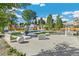 Stylish backyard retreat featuring a pool, outdoor seating, and patio dining set at 2981 Teller St, Wheat Ridge, CO 80033