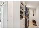 Walk-in closet with custom shelving and hanging space at 2981 Teller St, Wheat Ridge, CO 80033