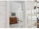 A bright hallway leads into another room, with light coming in from the yard at 2981 Teller St, Wheat Ridge, CO 80033