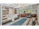A well-appointed kitchen space flows into an open-concept living room for modern living at 2981 Teller St, Wheat Ridge, CO 80033