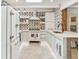 Updated kitchen with large countertops, modern appliances, and stylish backsplash at 2981 Teller St, Wheat Ridge, CO 80033
