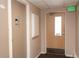 Hallway featuring multiple doors in a neutral colored hallway at 9155 E Center Ave # 1A, Denver, CO 80247
