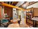 Unfinished basement with exposed ductwork and a bookcase at 5674 S Prescott St, Littleton, CO 80120