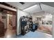 View of the finished basement area with an adjacent storage area at 5674 S Prescott St, Littleton, CO 80120