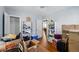 Spacious bedroom with hardwood floors and ample storage space, perfect for comfortable living at 5674 S Prescott St, Littleton, CO 80120