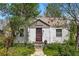 Charming home with white siding, a well-maintained yard, and a welcoming front entrance at 5674 S Prescott St, Littleton, CO 80120