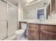 Clean bathroom featuring a glass-enclosed shower at 18193 E Kentucky Ave # 204, Aurora, CO 80017