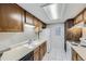 Functional kitchen with white appliances and ample counter space at 18193 E Kentucky Ave # 204, Aurora, CO 80017