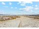 Panoramic view of a neighborhood surrounded by snow-dusted landscape with mountains in the distance at 3375 Umber Cir, Castle Rock, CO 80109